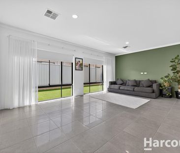 Low-Maintenance Family Living with Theatre, Study & Triple Garage - Photo 4