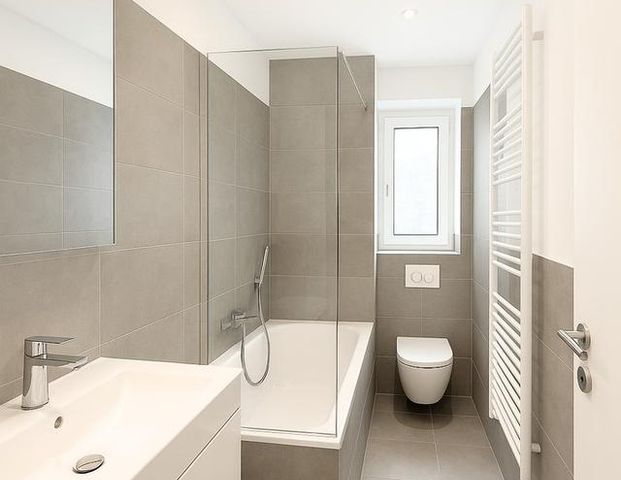 Freundliche & moderne Erdgeschosswohnung mit Terrasse zu vermieten - Photo 1