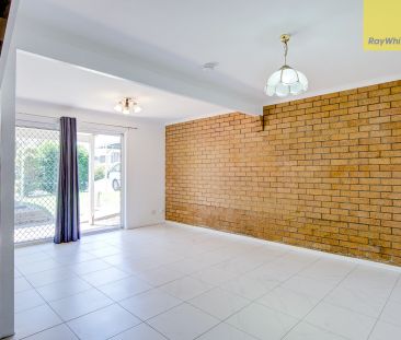 Townhouse in a gated complex with Pool - Photo 1