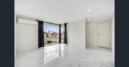 MODERN RENOVATED THREE BEDROOM HOME! - Photo 2