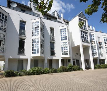 1,5-Zimmerwohnung mit Einbauküche in modernem Mehrfamilienhaus! - Foto 1