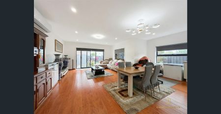 Contemporary Family Haven with Unbeatable Convenience - Photo 2