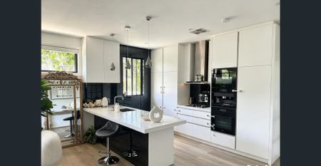 Renovated 3-Bedroom House with Spacious Living & Outdoor Entertaining - Photo 5