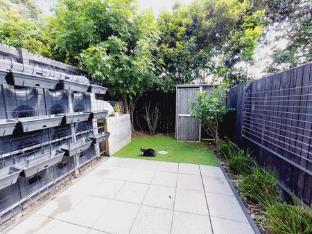Stylish 2-Bedroom Home with Modern Comforts & Private Outdoor Spaces - Photo 3