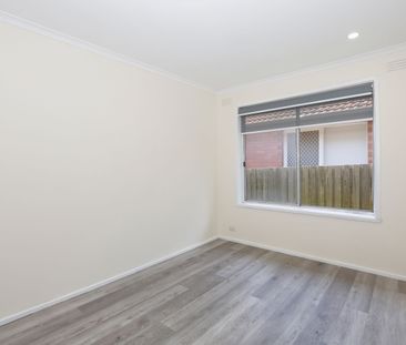 Spacious 3-Bedroom Home with Natural Light and Modern Amenities - Photo 2