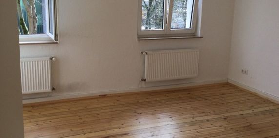 3- Zimmerwohnung mit abgeschliffenen Dielen und Balkon - Foto 2