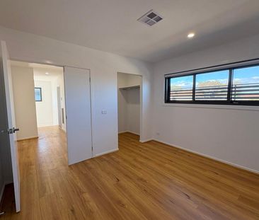 Modern 3-Bed, 2-Bath Family Living - Photo 2