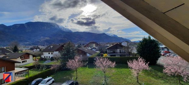 Location appartement rénové 3 pièces 75.31 m² à Scionzier (74950) 4 - Photo 1