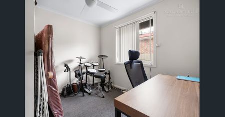 3-Bedroom Home with Large Backyard & Double Bay Shed - Photo 3