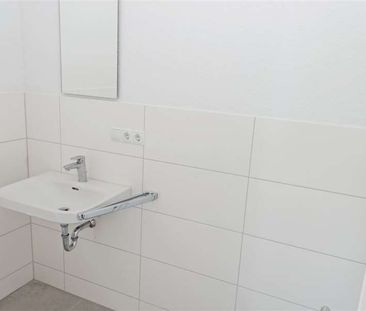 Schöne Neubauwohnung mit Terrasse in guter Lage von Schortens! - Foto 6