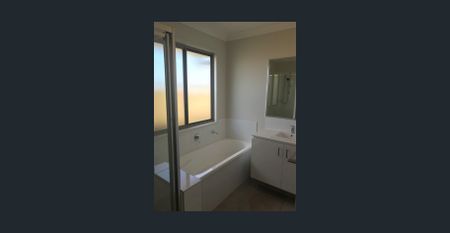 Spacious 4-Bedroom Low-Set Home in a Convenient Location - Photo 4