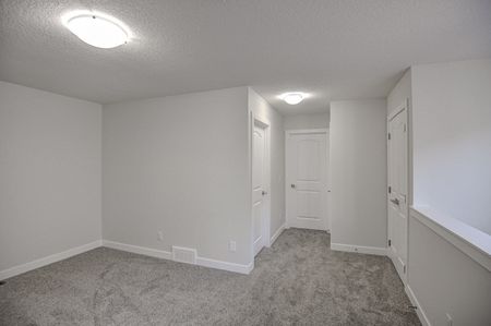 515 - Tekkara Dr NW, Calgary - Photo 3