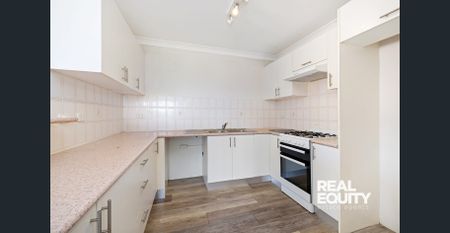 Top-Floor Apartment in a Sought After Lakeside Location - Photo 2