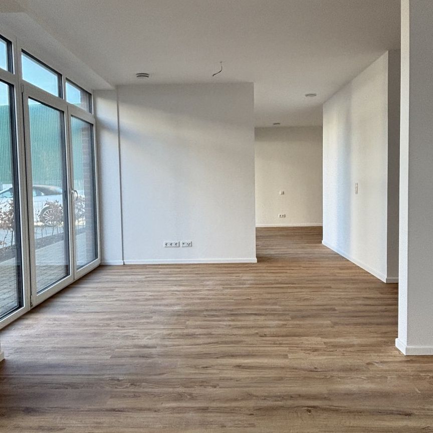 Erstebezug: Schöne Erdgeschosswohnung direkt am Norder Tief! - Photo 1