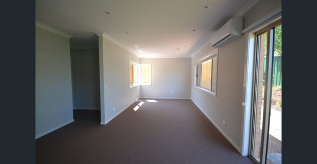 Modern & Low-Maintenance Home with Double Garage - Photo 1