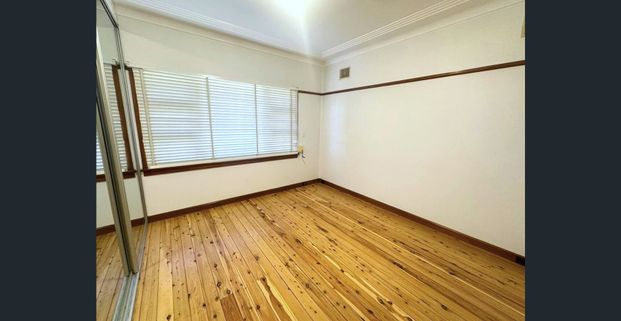 NEWLY UPDATED THREE BEDROOM HOME - Photo 1