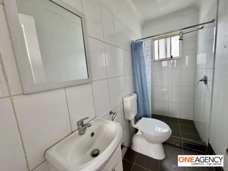 “Affordable 3-Bedroom, 2-Bathroom Flat in a Convenient Location.” - Photo 4