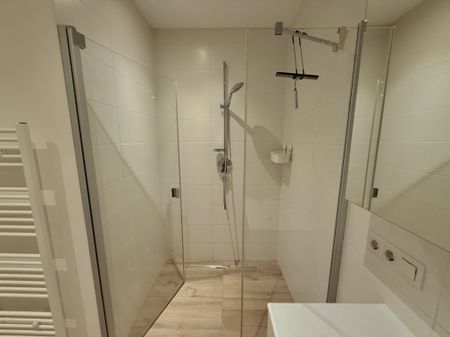 Ideale 2-Zimmer Gartenwohnung mit Tiefgarage und Parkplatz - Foto 3