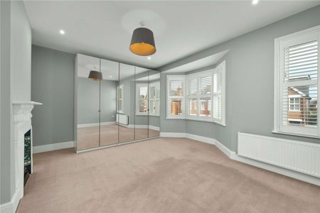 Four-bedroom home set on a private road, offering a harmonious blend of period character and contemporary style. Located within easy reach of local amenities, and excellent transport links. - Photo 3