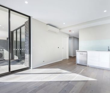 Modern two bedroom unit - 20% below market rent - Photo 2