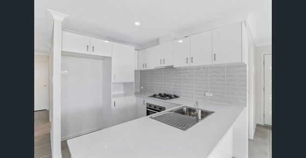 Modern and Spacious Rental Property in Logan Reserve - Your Ideal Home Awaits! - Photo 1