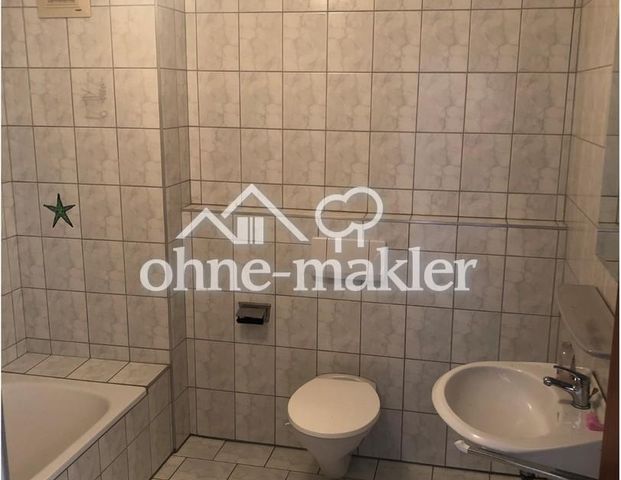 Helle 2-Zi-DG-Wohnung (65m²) mit 7.500€-Premium-Küche & Südbalkon - Foto 1