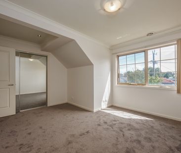 Spacious 3-Bedroom Townhouse - Photo 1