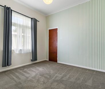 Spacious Family Home with Expansive Outdoor Living - Photo 1