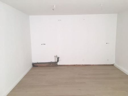 Modernisierte Wohnung mit gerÃ¤umiger Wohn-Ess-KÃ¼che in Stadtmitte - Photo 4