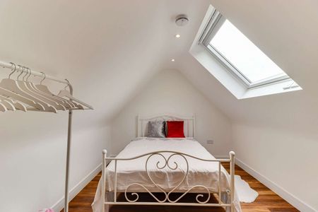 Five bedroom family home with driveway parking and lovely garden in a prime village setting. - Photo 4