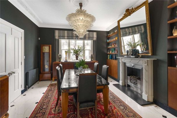 A 'key' Grade II listed part stucco fronted house, located just off Onslow Gardens. - Photo 1