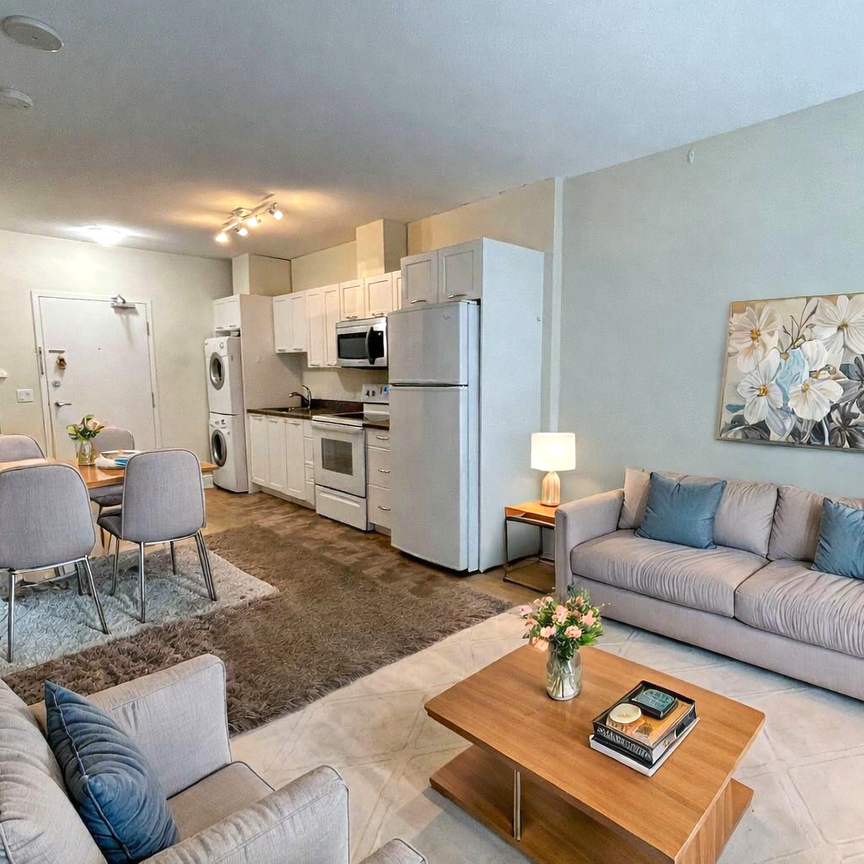 Bright 7th Floor Condo– Steps To U Of C & Brentwood Lrt. - Photo 1