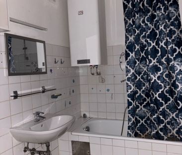 Zentrale 3-Zimmer-Wohnung mit Balkon und Einbauküche (Befristung: 3... - Photo 6