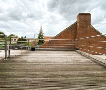 RUIM APPARTEMENT MET TWEE SLAAPKAMERS EN TERRAS IN CENTRUM SLEIDINGE - Photo 1