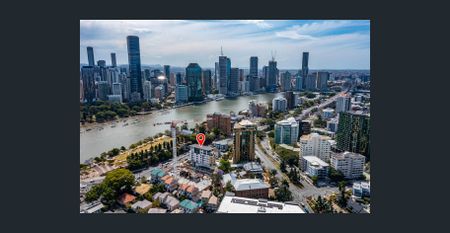 Nestled in the vibrant and picturesque suburb of Kangaroo Point, this property offers an exceptional living experience that combines modern comfort - Photo 4