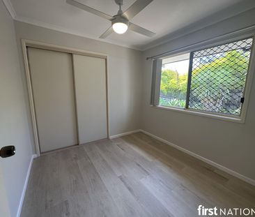 LOVELY LOWSET FAMILY HOME ON A LARGE CORNER BLOCK - Photo 5