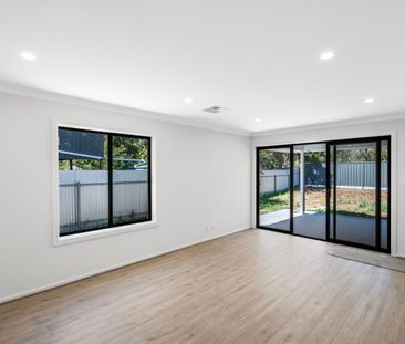 Spacious Home with Outdoor Entertaining in Prime Location - Photo 1