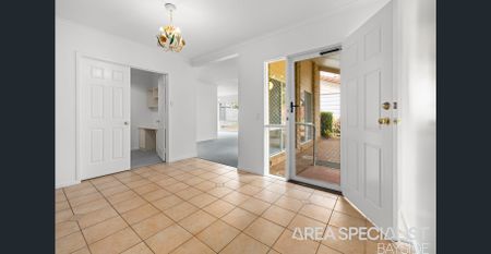 Elevated Family Home with Water Glimpses & Room to Move! - Photo 2