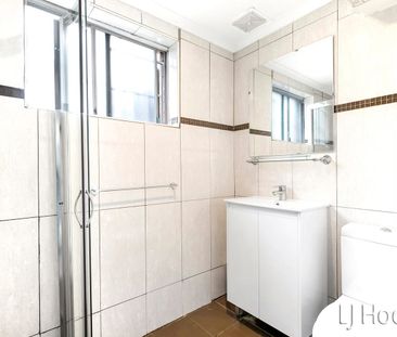 BRIGHT & SUNNY RENOVATED TWO BEDROOM UNIT - Photo 3