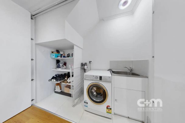 “Modern Street-Facing Townhouse with City Views” - Photo 1