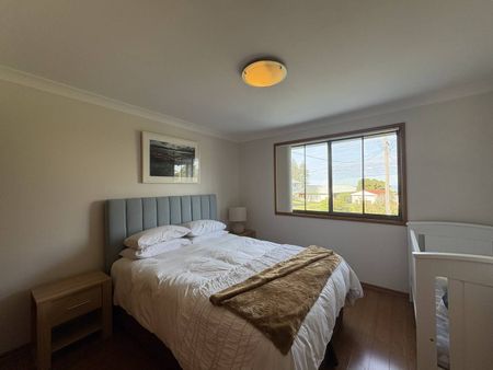 Furnished 2 Bedroom House Moments from the Beach - Photo 5