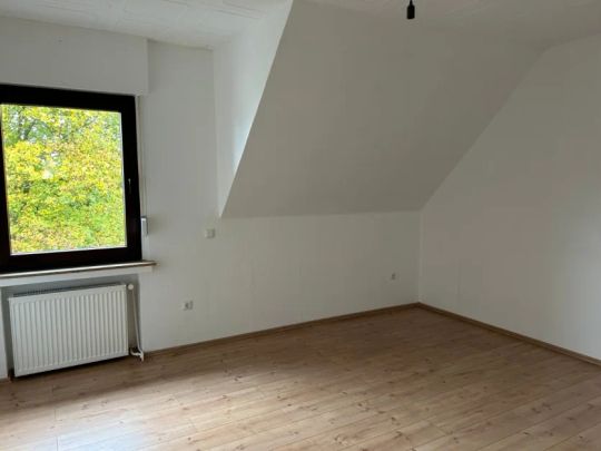 Moderne Dachgeschosswohnung über zwei Ebenen - Foto 1