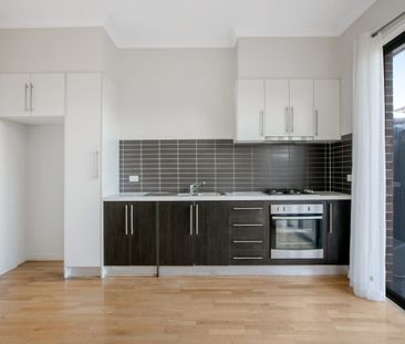 Spacious Light filled Townhouse in Terrific Location! - Photo 3