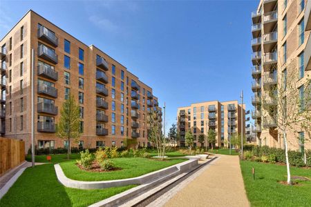 A modern top floor apartment with south facing balcony offering far reaching views in the sought after Horlicks development by Berkeley Homes. - Photo 4