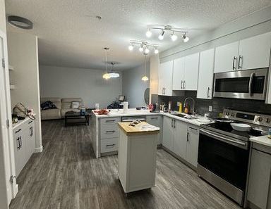 spacious 1 bed room Apartment | 112 - 108 Country Village Circle Northeast, Calgary - Photo 1