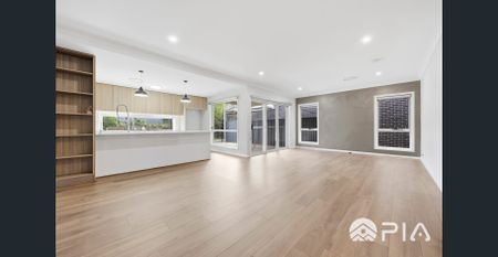 MODERN FOUR BEDROOM FAMILY HOME WITH SPACIOUS LIVING & LANDSCAPED BACKYARD - Photo 2