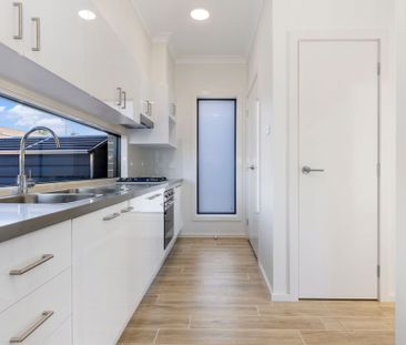 Stylish Near-New 2-Bedroom Home with Spacious Outdoor Living - Photo 1