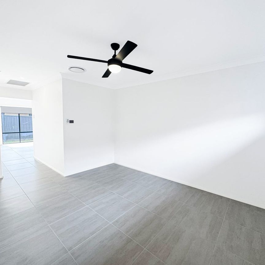 Stylish Family Home in the Heart of Aberglasslyn - Photo 1