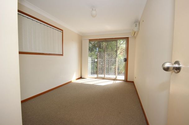 WELL POSITIONED END TOWNHOUSE - Photo 1