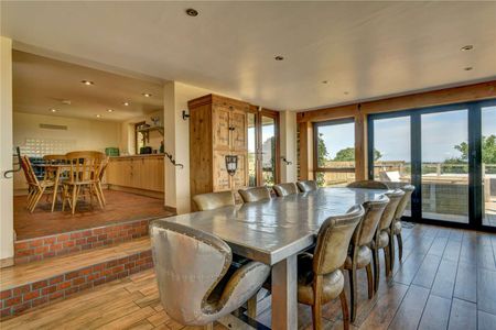 An exceptional family home nestled in unspoilt countryside boasting panoramic views - Photo 4